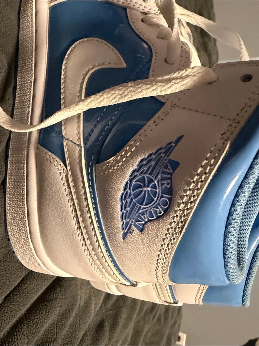 8 men’s Air Jordan UNC color way mid tops